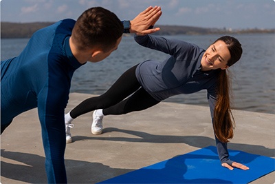 A man and a woman train together to build a strong bond