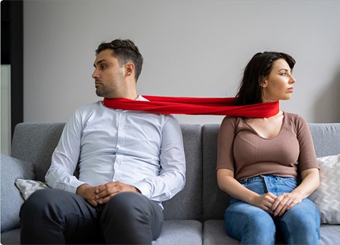 Photo of a man and a woman representing a red flag between them